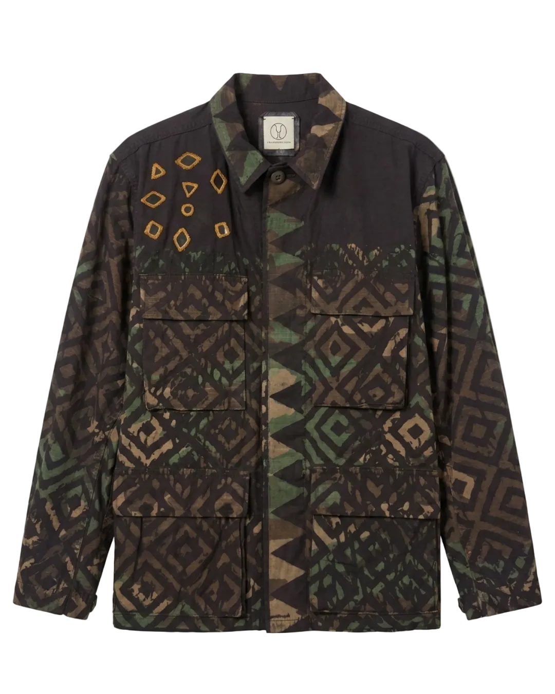 Exclusive reworked military jacket featuring earthy Natural dye (recycled iron + raw sugar), subtle geometric patterning, and artisan mirror embroidery