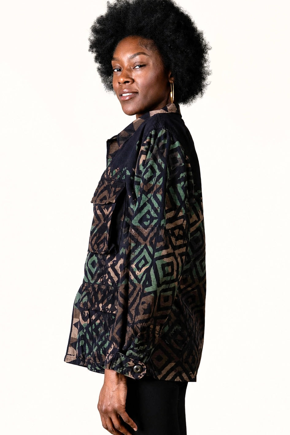 Exclusive reworked military jacket featuring earthy Natural dye (recycled iron + raw sugar), subtle geometric patterning, and artisan mirror embroidery