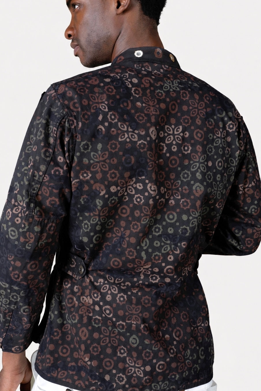 One-of-one vintage army jacket featuring tonal camouflage, natural iron dye process, and artisan mirror embroidery