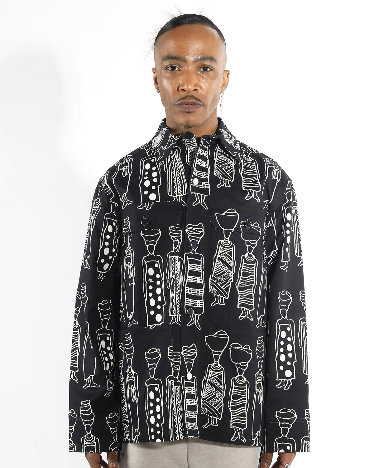 unisex chore coat in organic cotton , featuring a black and white market ladies figure drawing design. relax fit with pratical  patch pockets